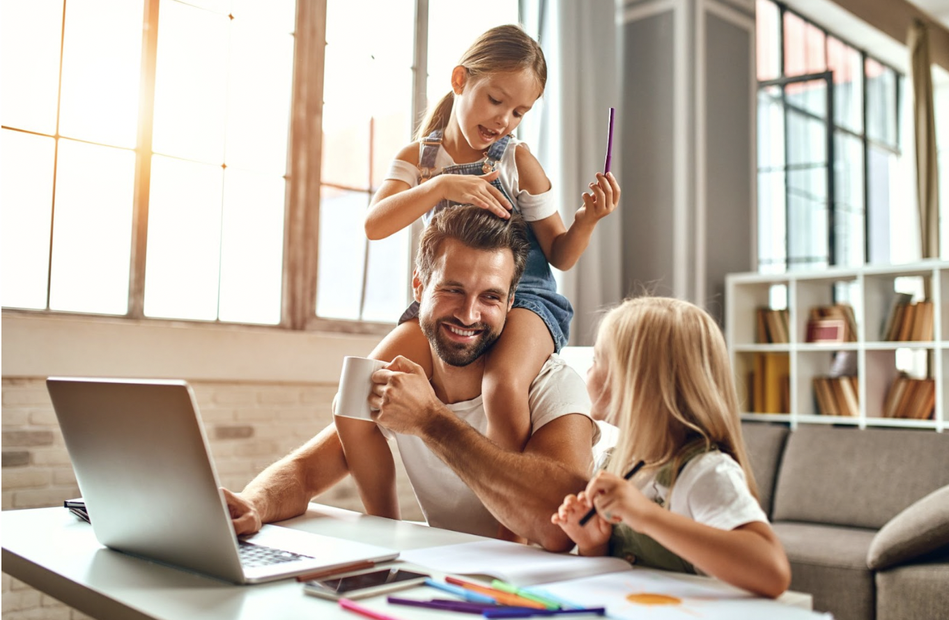 Dad and two daughters in short-term rental home.