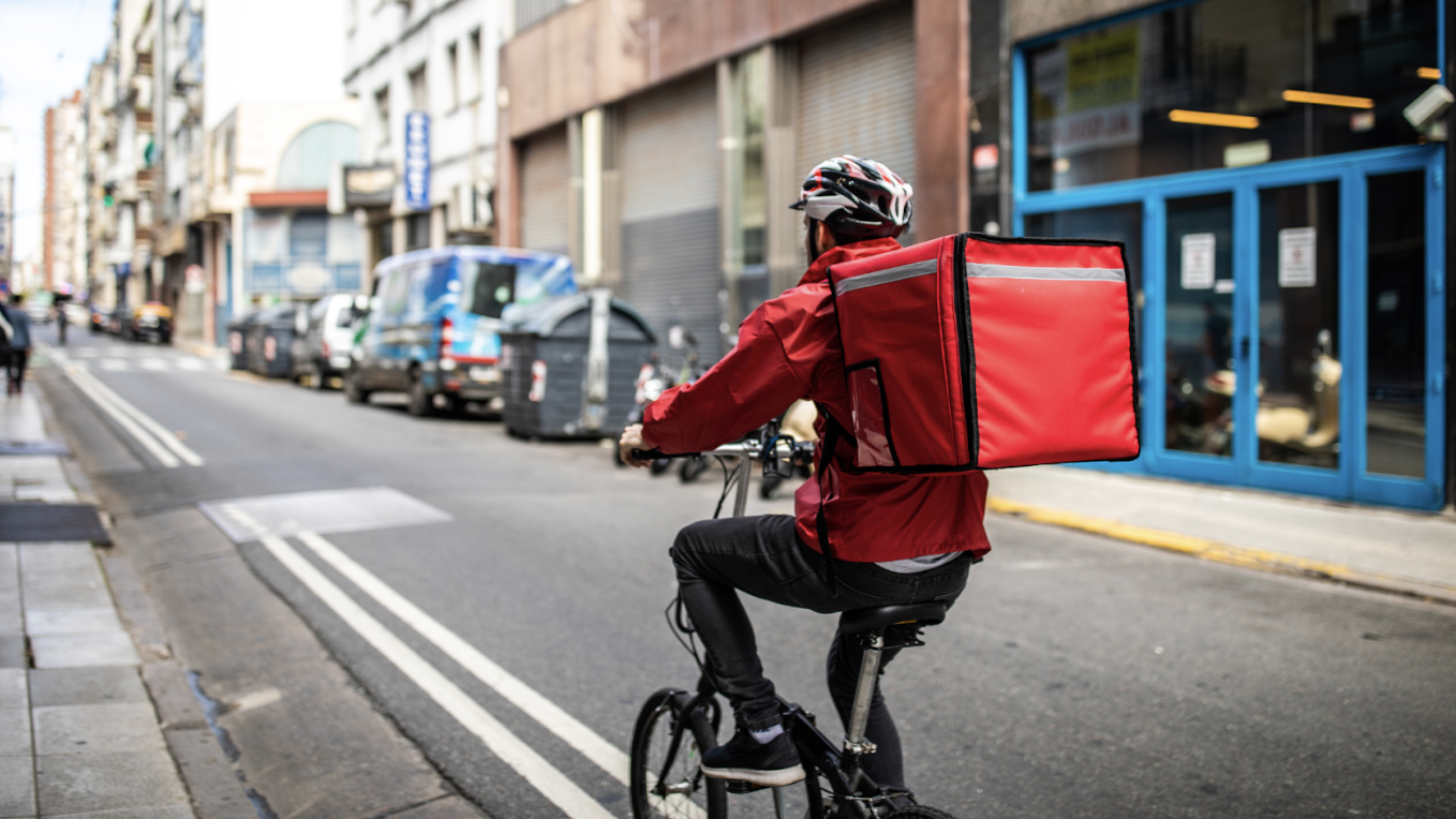 Food delivery man on bike