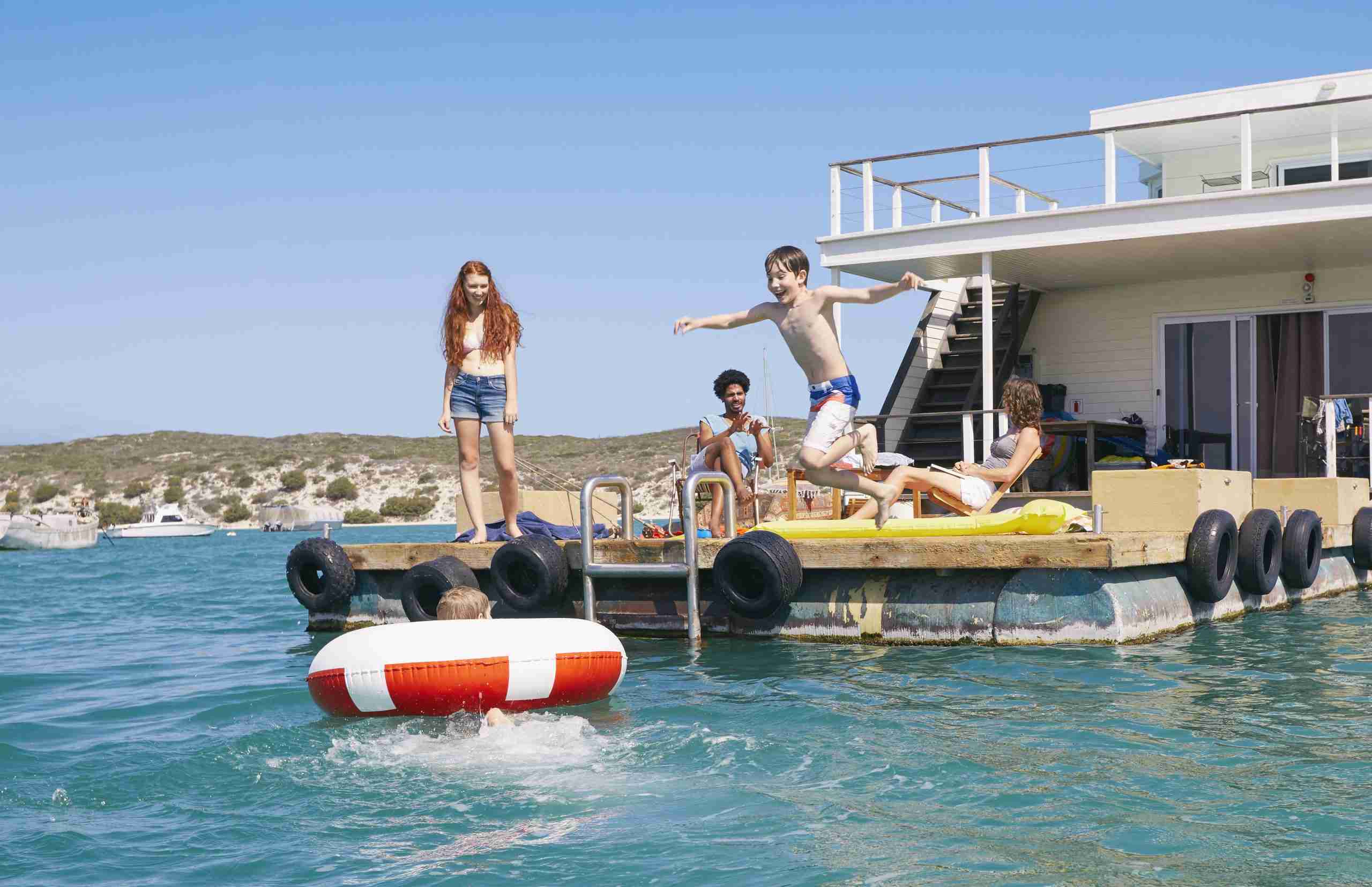 Family having fun on house boat