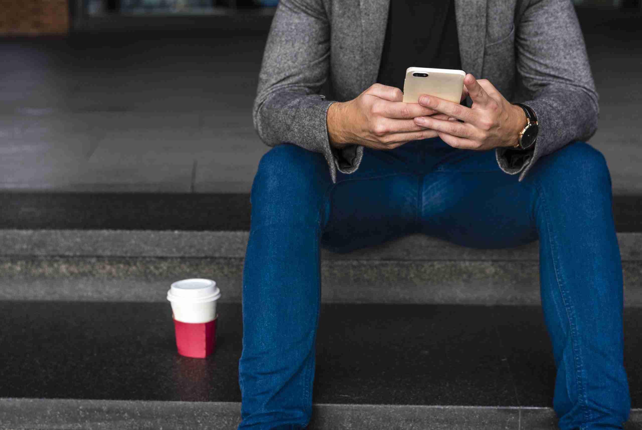 Host sitting on porch while waiting for a guest