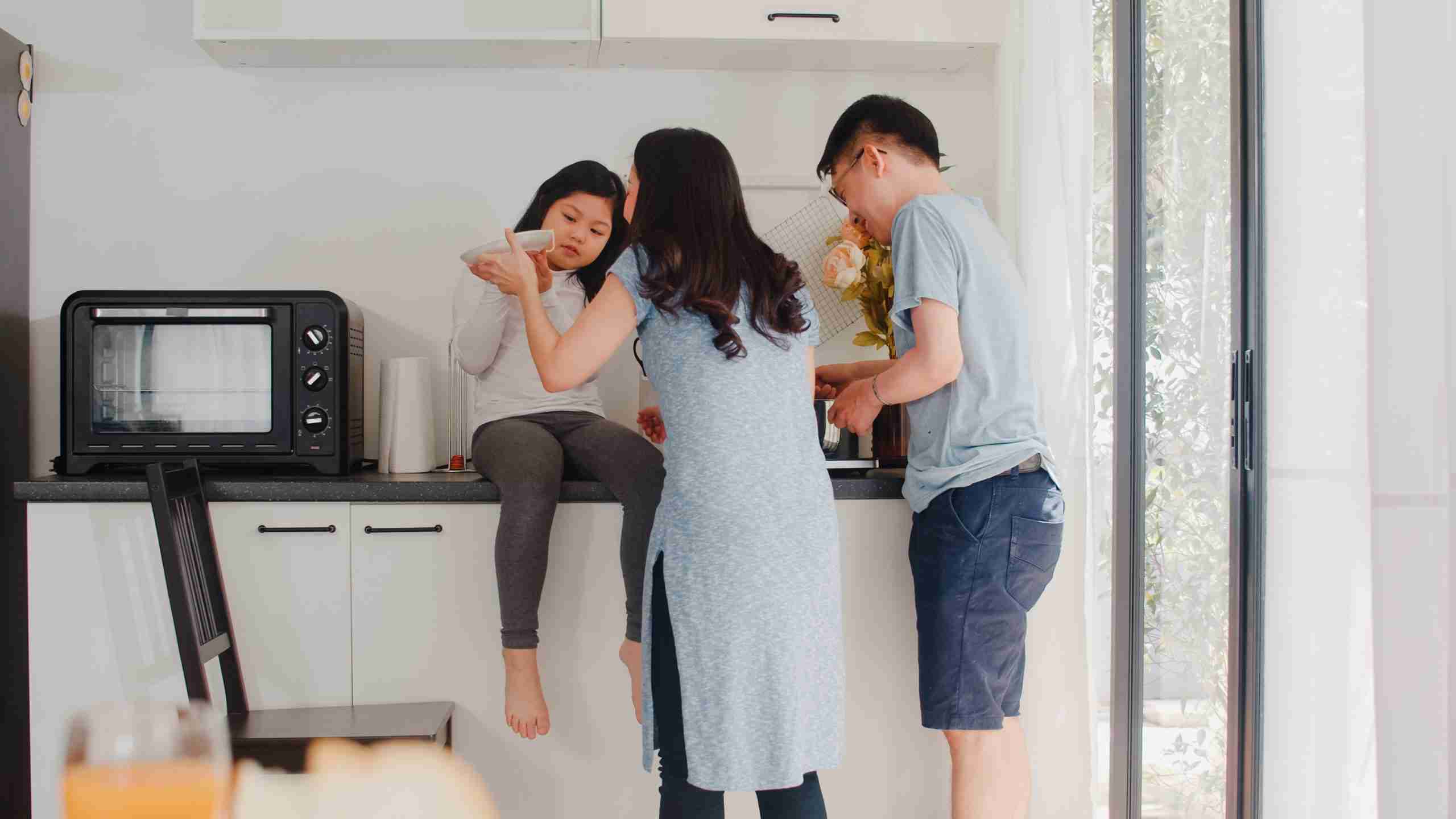 Young Asian Japanese family cooking at home. Lifestyle happy Mom